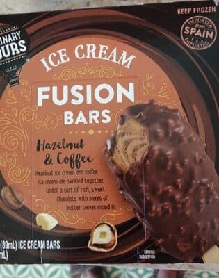 HAZELNUT & COFFEE HAZELNUT ICE CREAM AND COFFEE ICE CREAM ARE SWIRLED TOGETHER UNDER A COAT OF RICH, SWEET CHOCOLATE WITH PIECES OF BUTTER COOKIE MIXED IN FUSION BARS, HAZELNUT & COFFEE
