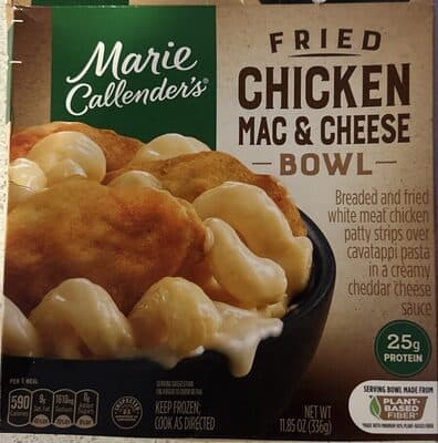 FRIED CHICKEN MAC & CHEESE BREADED AND FRIED WHITE MEAT CHICKEN PATTY STRIPS OVER CAVATAPPI PASTA IN A CREAMY CHEDDAR CHEESE SAUCE BOWL, FRIED CHICKEN MAC & CHEESE
