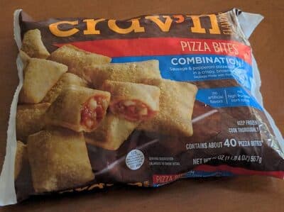 COMBINATION SAUSAGE & PEPPERONI PIZZA WRAPPED IN A CRISPY, BROWNED CRUST, COMBINATION