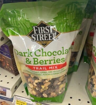 A BLEND OF PEANUTS, ALMONDS, DARK CHOCOLATE CHIPS, CRANBERRIES, BLUEBERRIES, PISTACHIOS & PUMPKIN SEED KERNELS TRAIL MIX