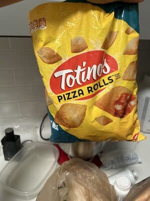 TRIPLE MEAT SAUSAGE, CANADIAN STYLE BACON, GROUND PORK & PEPPERONI SEASONED PORK, CHICKEN AND BEEF PIZZA TOPPING PIZZA IN A GOLDEN CRUST, TRIPLE MEAT