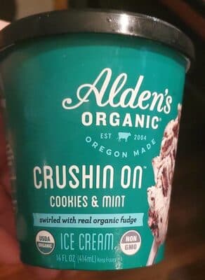 CRUSHIN ON COOKIES & MINT SWIRLED WITH REAL ORGANIC FUDGE ICE CREAM, COOKIES & MINT