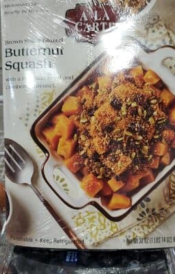 BROWN SUGAR GLAZED BUTTERNUT SQUASH ACCOMPANIED WITH A PUMPKIN SEED AND CRANBERRY STREUSEL TOPPING, BROWN SUGAR GLAZED BUTTERNUT SQUASH