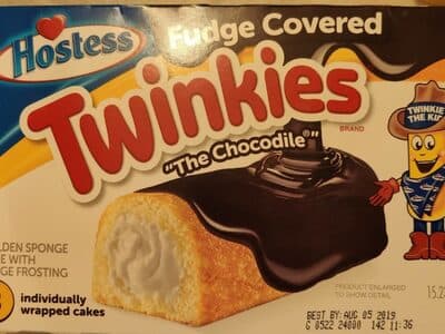 THE CHOCODILE FUDGE COVERED GOLDEN SPONGE CAKE WITH FUDGE FROSTING