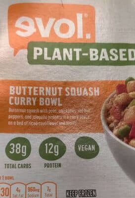 PLANT-BASED BUTTERNUT SQUASH WITH PEAS, CHICKPEAS, RED BELL PEPPERS, AND JALAPENO PEPPERS IN A CURRY SAUCE, ON A BED OF RICED CAULIFLOWER AND LENTILS BOWL, BUTTER SQUASH CURRY