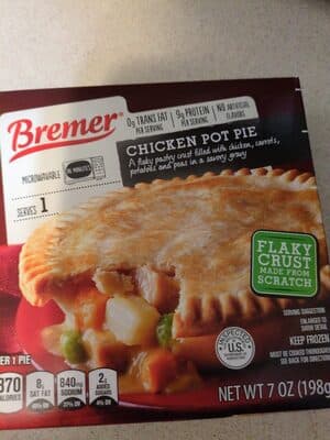 CHICKEN POT PIE A FLAKY PASTRY CRUST FILLED WITH CHICKEN, CARROTS, POTATOES AND PEAS IN A SAVORY GRAVY, CHICKEN POT PIE